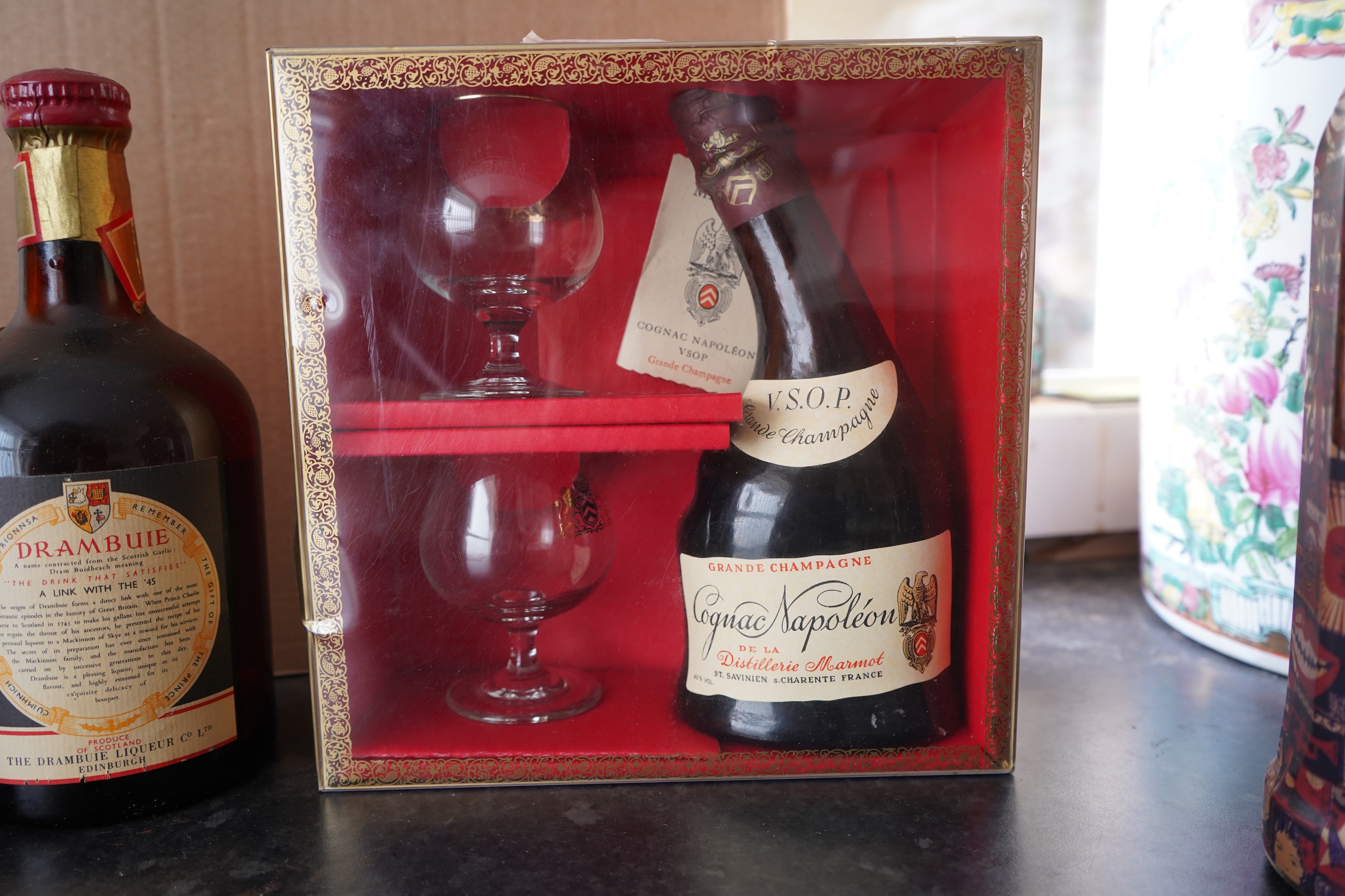 Six bottles of spirits and liqueurs, including whiskey and gin